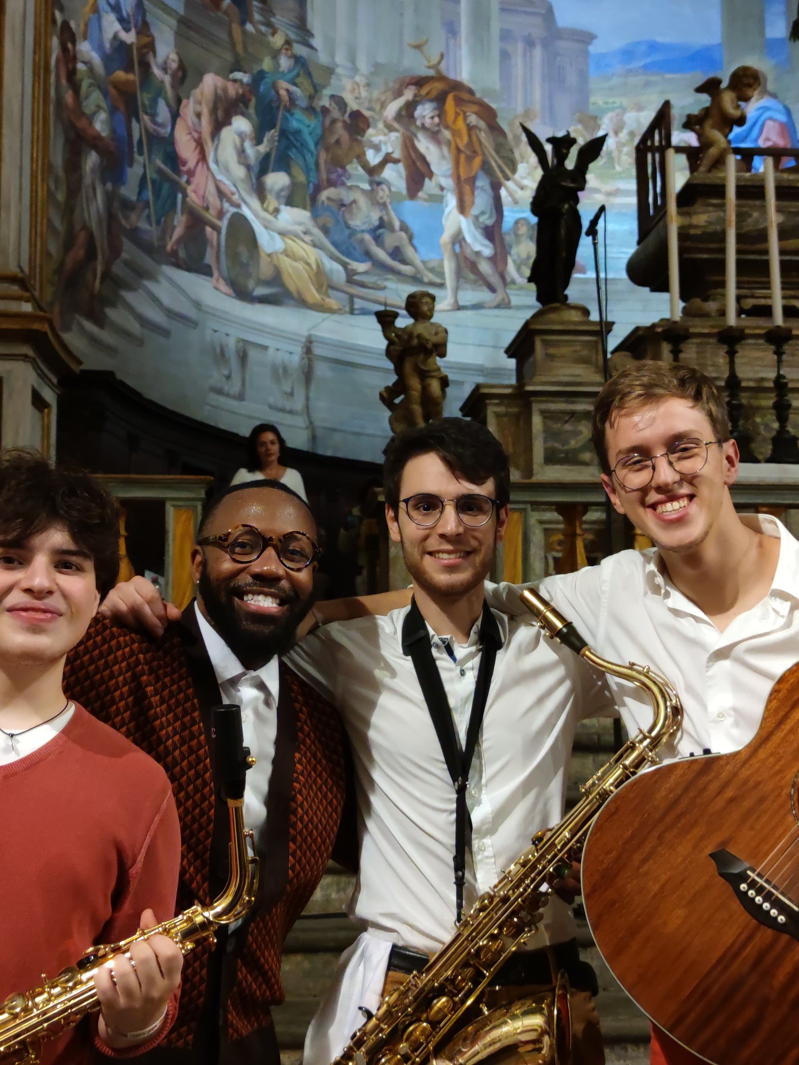 Jemero Carter with fellow musicians in Italy